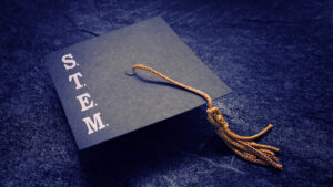 Graduation cap with STEM spelled on it