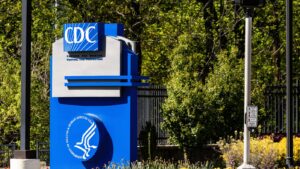 Signage of the Centers for Disease Control and Prevention (CDC) at the entrance of the CDC headquarters in Atlanta, GA
